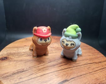 3D-Printed Articulated Llamas with Hats - Carl and Paul