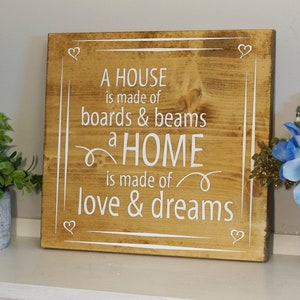 A house is made of boards & beams a home is made of love and dreams wood sign | home decor | housewarming gift | family house wall hanging