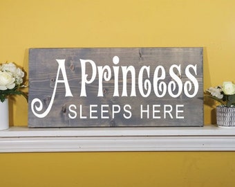 A Princess sleeps here wood sign - Princess decor - bedroom decor for her - baby room decor - girls room wall decor - girl baby shower gift