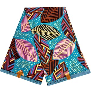 May include: Vibrant fabric with a teal background and a repeating leaf pattern. The leaves are filled with brown, purple, yellow, and black stripes. Small white dots are scattered across the teal background. The fabric has a blue border with text.