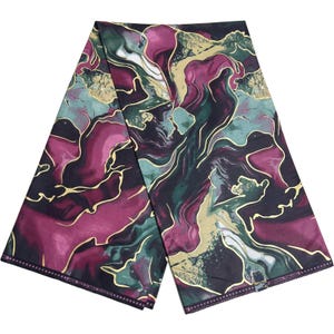 May include: A folded fabric featuring a marbled design in burgundy, teal, and gold. The fabric has a dark background with flowing patterns and gold accents. The edges are finished with a dotted border.
