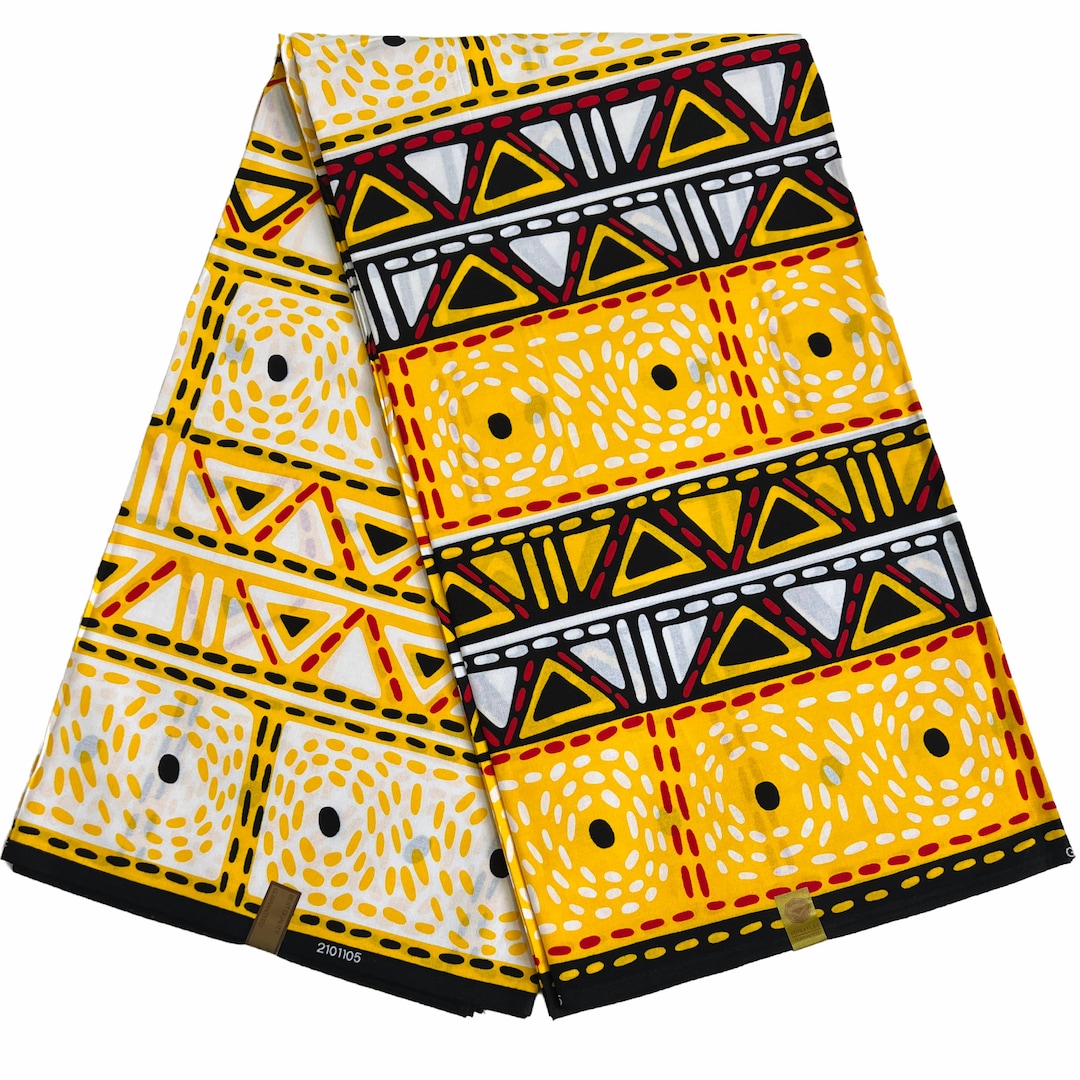 Black and White African Print Fabric with Red Sunburst and Geometric Patterns