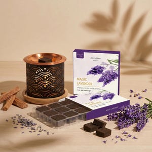 May include: Aromafume Magic Lavender smokeless incense bricks for relaxation. The image shows a decorative copper and black incense burner, incense bricks, and a box of Magic Lavender incense bricks. The box features a lavender sprig illustration.