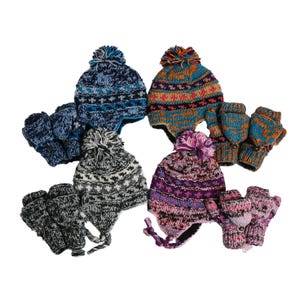 May include: Four sets of knit winter hats with pom-poms and earflaps paired with matching fingerless gloves. The sets feature blue, orange, black, and purple color schemes with intricate geometric patterns and braided ties.