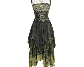 May include: A sleeveless dress featuring a dark charcoal and olive green color palette. The bodice includes a lace overlay and a central corset-style lace-up detail. The skirt has an asymmetrical handkerchief hem with a floral pattern and lace trim.