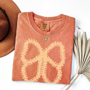 Comfort Colors Coquette Puakenikeni Big Bow Shirt - Puakenikeni Lei Shirt - Mother Gift - Coquette Aesthetic - Lei T-Shirt - Coquette Fall