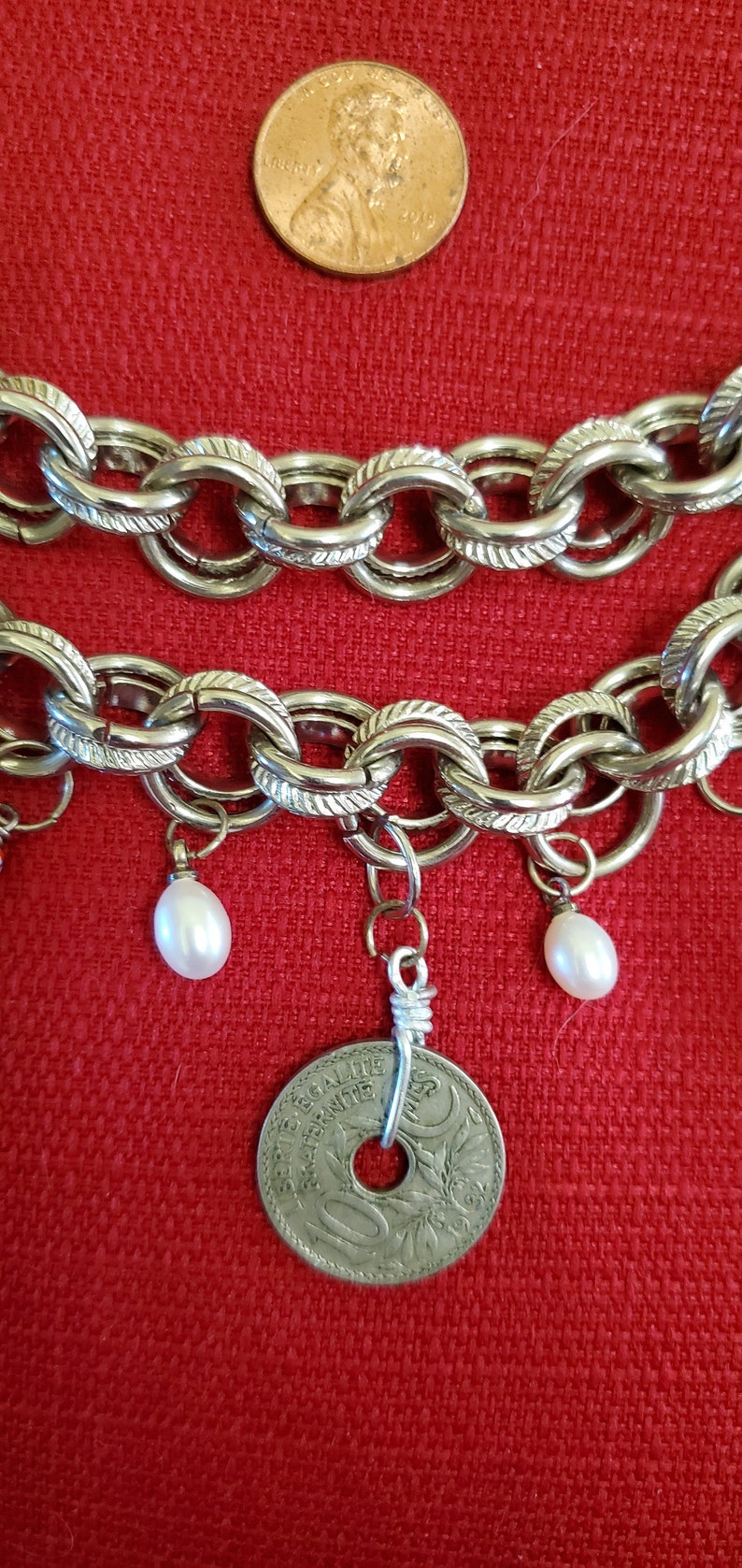 Multi-strand silver-toned necklace with charm beads