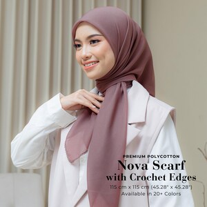 May include: A mauve coloured scarf with crochet edges. The scarf is made of polycotton and measures 115 cm x 115 cm (45.28" x 45.28"). Available in 20+ colours.