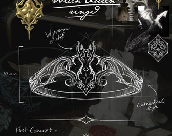 May include: A design sketch of a ring featuring a wyvern motif with spread wings and a central star element. The image includes the text Witch Queen ring, Wyvern motif, Cathedral Style, and First Concept, with a 10 mm measurement indicator.