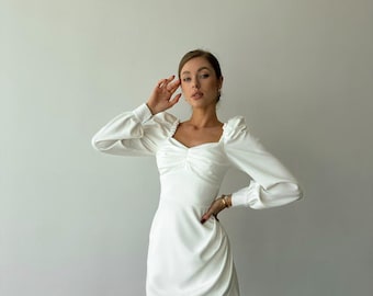 White Bodycon Mini Dress with Long Sleeves and Sweetheart Neckline