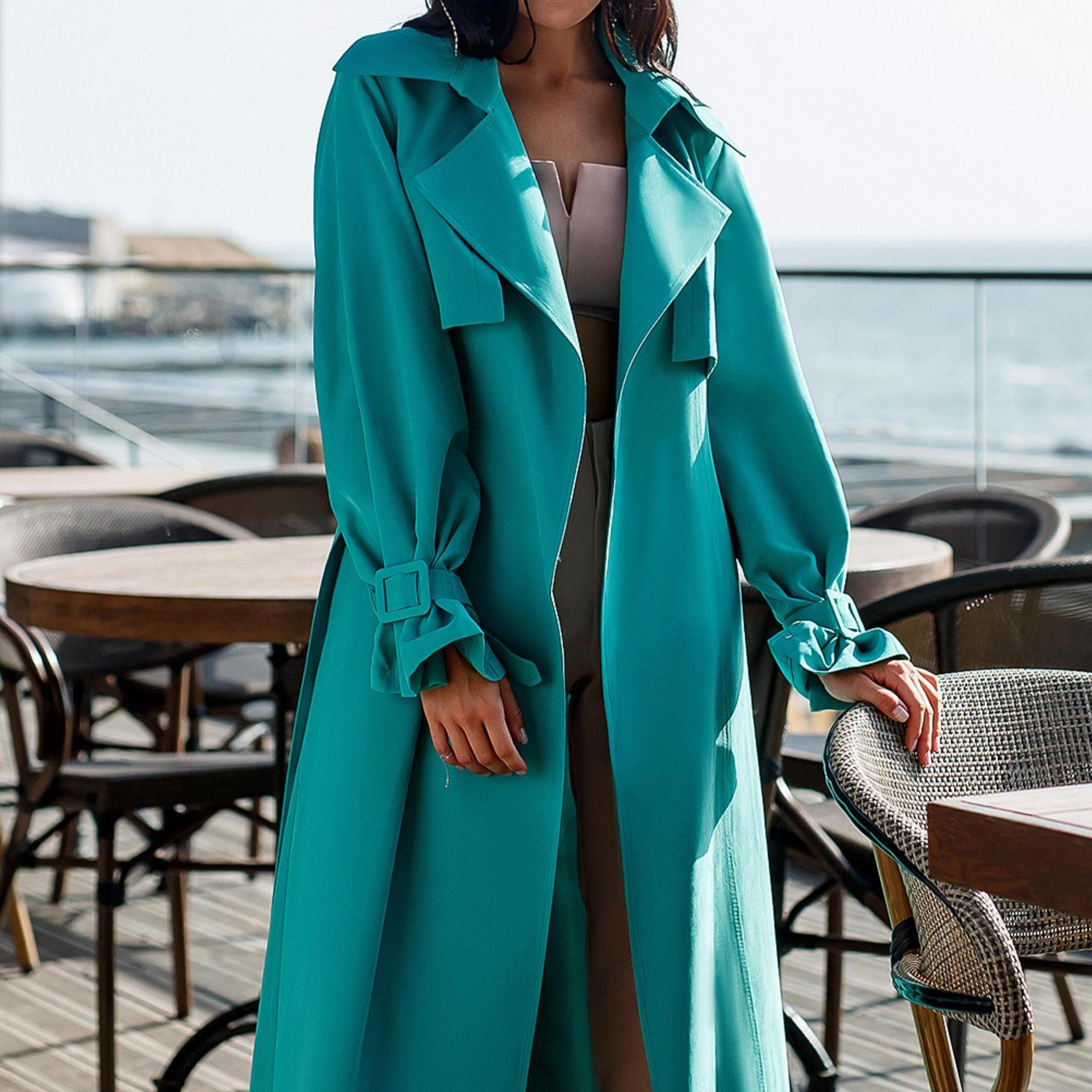 women turquoise trench coat