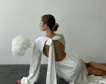 White Maxi Silk Satin Gown with Open Back, Bow Tie and flared sleeves
