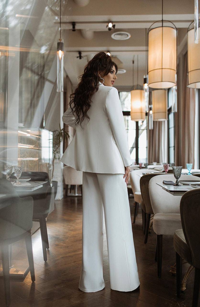womans white trouser suit
