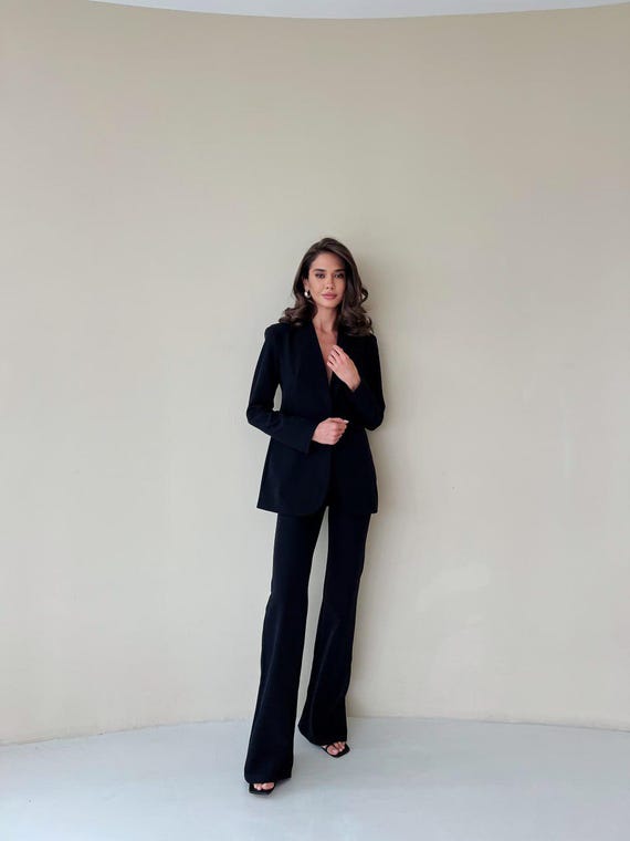 dress with flare crossword clue Casual Fitting Black Flare Dress Pants main image 0