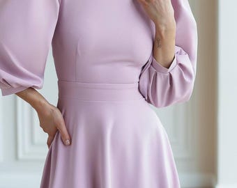 Dusty pink midi dress with open back and voluminous half sleeves
