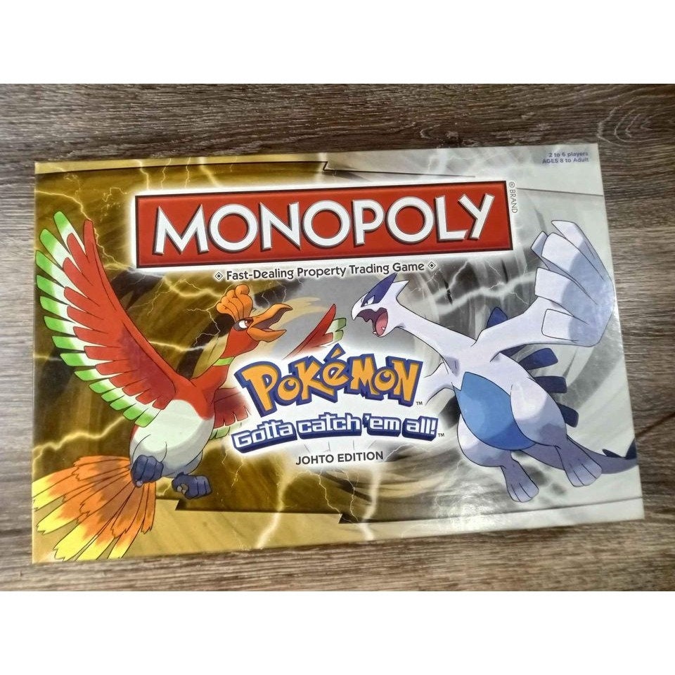 Monopoly Pokémon Edition Gioco Da Tavolo In Tedesco - Cattura 48 Pokémon, 4 Pedine Esclusive: Felori, Croco, Kwak E Pikachu, Gioco Di Strategia Per Famiglie