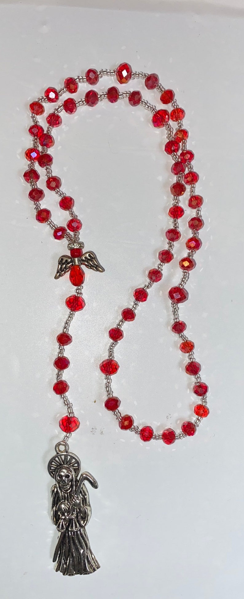 Santa muerte rosary with angel centerpiece