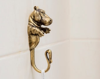 A wall hook for clothes is made of brass in the form of a hippopotamus, a wall hanger in the bathroom, in the children's room,Backpack hook