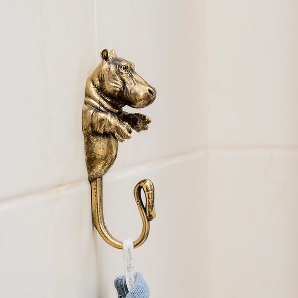 Un gancho de pared para ropa está hecho de latón con forma de hipopótamo, un colgador de pared en el baño, en la habitación de los niños,Gancho para mochila