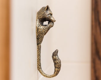 Raccoon Brass Wall Hook: Crafted from Cast Metal, Sturdy, Durable, and Exquisitely Detailed. Ideal for Hanging Clothes,Towels,Hats,and More.