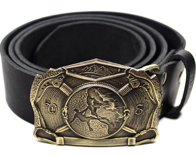 Leather belt with brass buckle for rock climbers and climbers.