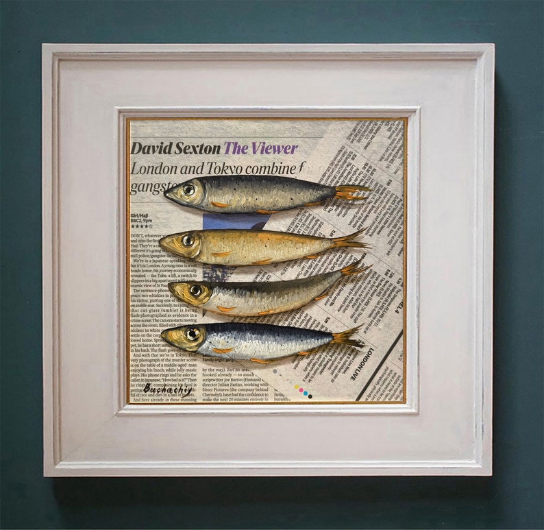 May include: A framed print of a newspaper clipping with the title "The Viewer" by David Sexton. The clipping features a painting of five silver fish arranged in a row on a newspaper background.