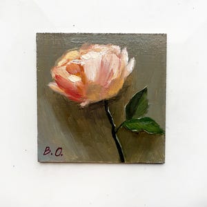 May include: A small painting of a single pink flower with green leaves on a gray background. The painting is signed "B.O."