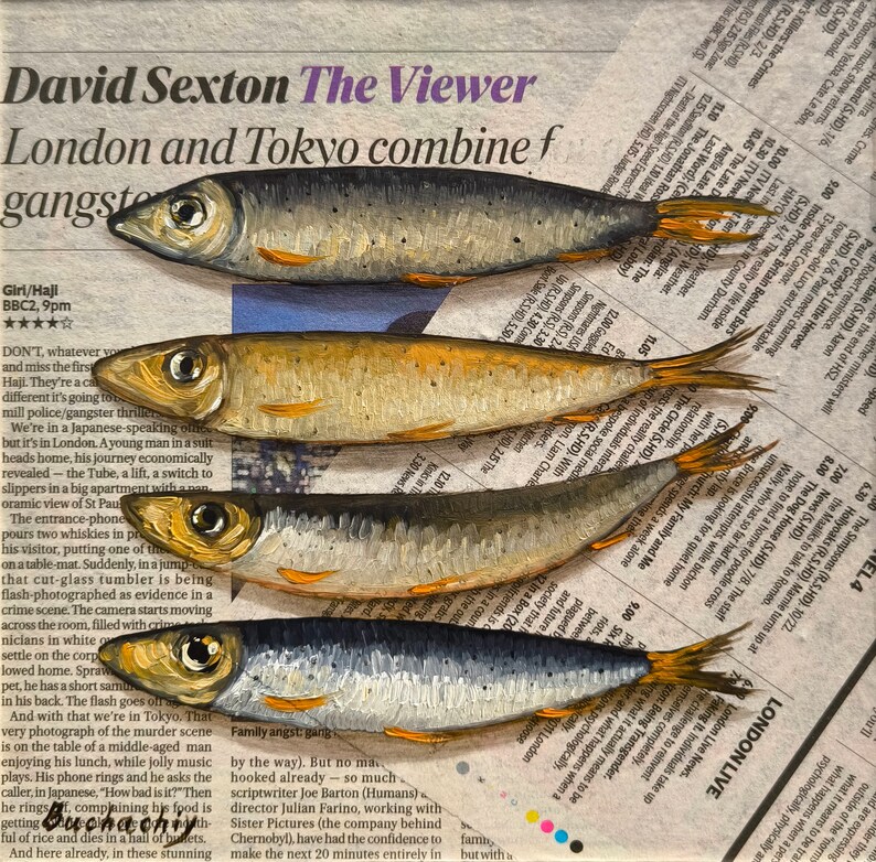 May include: Five painted sardines arranged in a row on a newspaper background. The sardines are painted in a realistic style with details of scales and fins. The newspaper text is partially visible and includes the words "London and Tokyo combine" and "The Viewer".