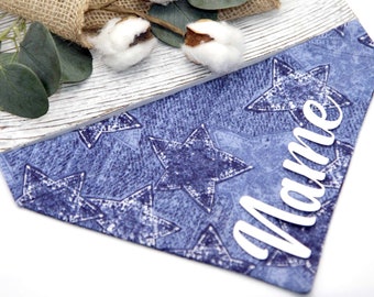 May include: A wooden sign with a blue fabric background featuring white stars. The word "Mame" is written in white on the fabric.