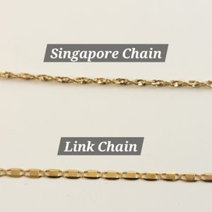 May include: Two gold chains, one is a Singapore chain and the other is a link chain.