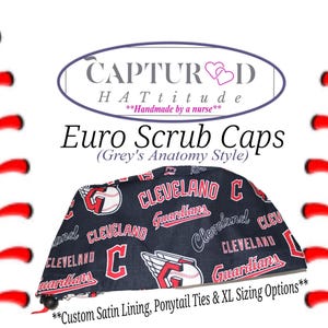May include: Euro scrub cap with a navy blue background featuring the Cleveland Guardians logo and text in red and white. The cap has a custom satin lining and ponytail ties. The text "CAPTURED HATtitude" is at the top.