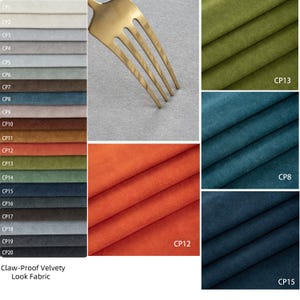 May include: A collection of twenty fabric swatches labeled CP1 through CP20, featuring a velvety texture. The display includes a gold fork resting on a light gray swatch, alongside larger folded samples in olive green, orange, and deep blue shades.