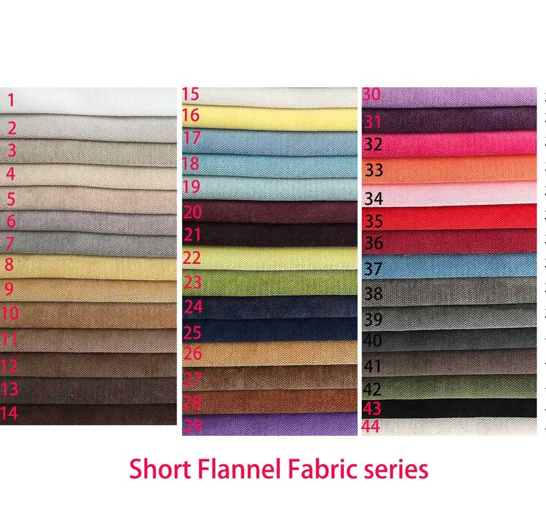 May include: A color chart displaying forty-four swatches of short flannel fabric arranged in three vertical columns. Each swatch is numbered from 1 to 44, showcasing a wide spectrum of colors including neutrals, pastels, and vibrant tones. The text Short Flannel Fabric series is printed at the bottom.