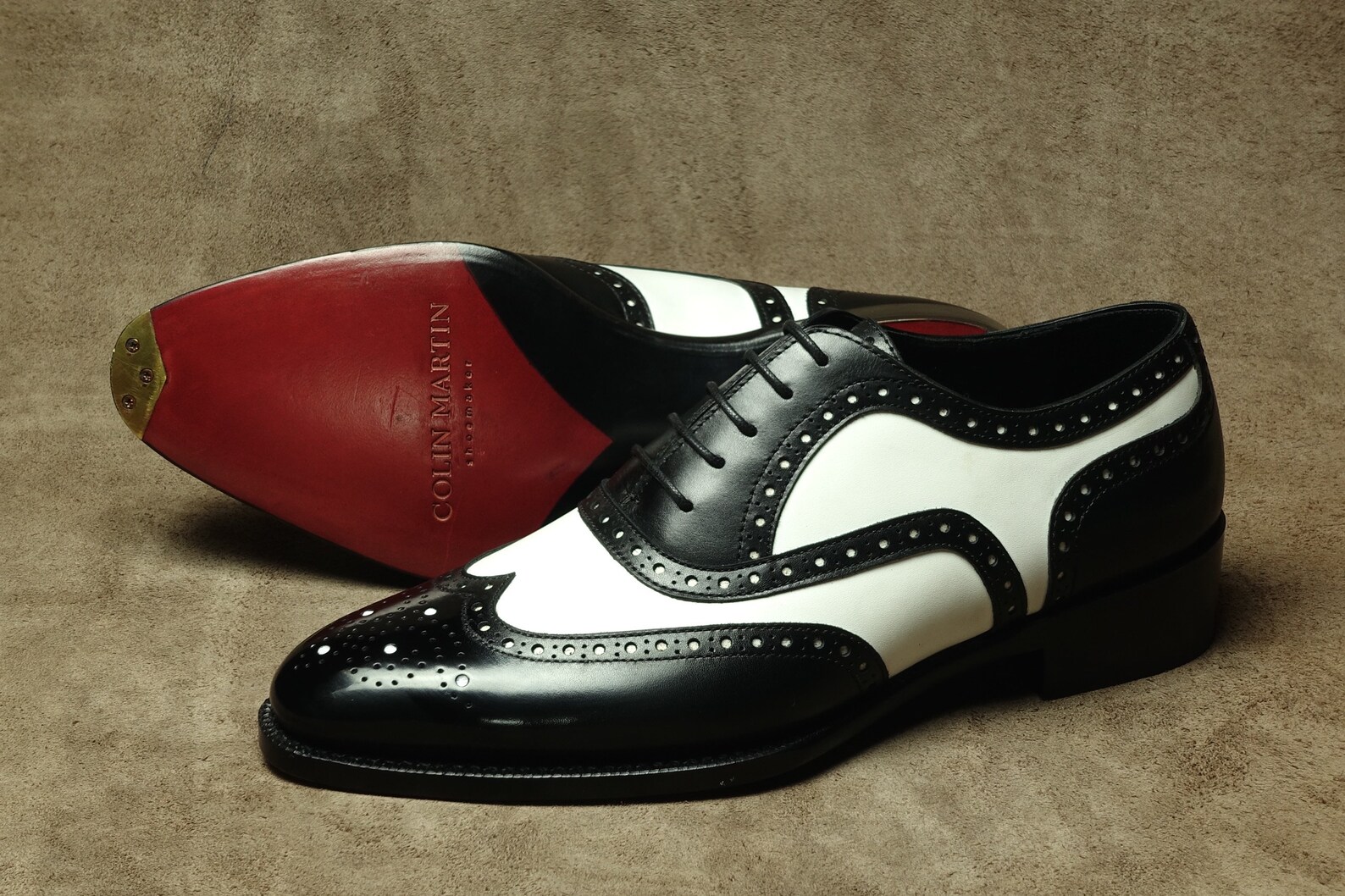 black and white spectator flats