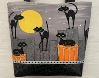 Black Cats on Grey with a Vinyl Bottom