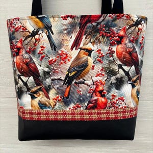 Monedero de tela Redbirds con base de vinilo