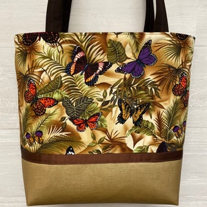 Tan Butterflies Purse with a Vinyl Bottom