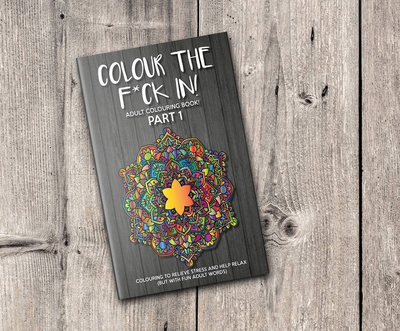 May include: A coloring book cover with a colorful mandala design and the title "COLOUR THE F*CK IN!"  Adult Coloring Book! Part 1.  The text below the mandala reads "Colouring to relieve stress and help relax (but with fun adult words)".