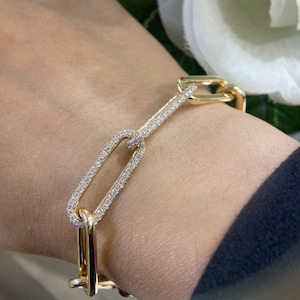 Yellow Gold Paperclip Link Bracelet with Diamonds on Two Continuous Links.