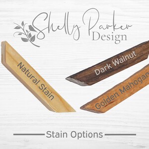 May include: Three wood samples showing different stain options: Natural Stain, Dark Walnut, and Golden Mahogany. Stain Options.