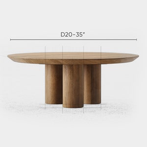 May include: A round wooden table with three cylindrical legs. The table's diameter ranges from 20 to 35 inches, with a height of 8 to 20 inches and a thickness of 1.5 inches. The table has a natural wood finish.