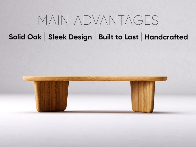 May include: A handcrafted solid oak bench with a sleek design. The bench features a rectangular top and two trapezoidal legs. The text "MAIN ADVANTAGES" and the words "Solid Oak | Sleek Design | Built to Last | Handcrafted" are displayed above the bench.