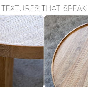 May include: Close-up of a round wooden table top with a natural wood grain finish. The table has a slightly raised edge and a smooth surface.