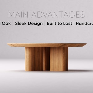 Może przedstawiać: St&oacute;ł wykonany z litego drewna dębowego o eleganckim designie. St&oacute;ł ma okrągły blat i cztery nogi. Tekst "MAIN ADVANTAGES" jest wyświetlany nad stołem, a tekst "Solid Oak | Sleek Design | Built to Last | Handcrafted" jest wyświetlany pod stołem.