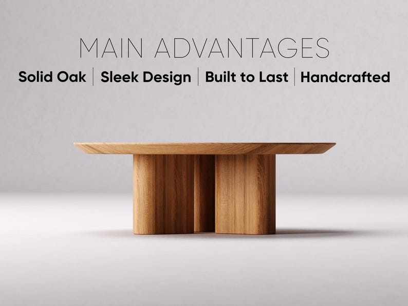 Może przedstawiać: St&oacute;ł wykonany z litego drewna dębowego o eleganckim designie. St&oacute;ł ma okrągły blat i cztery nogi. Tekst "MAIN ADVANTAGES" jest wyświetlany nad stołem, a tekst "Solid Oak | Sleek Design | Built to Last | Handcrafted" jest wyświetlany pod stołem.