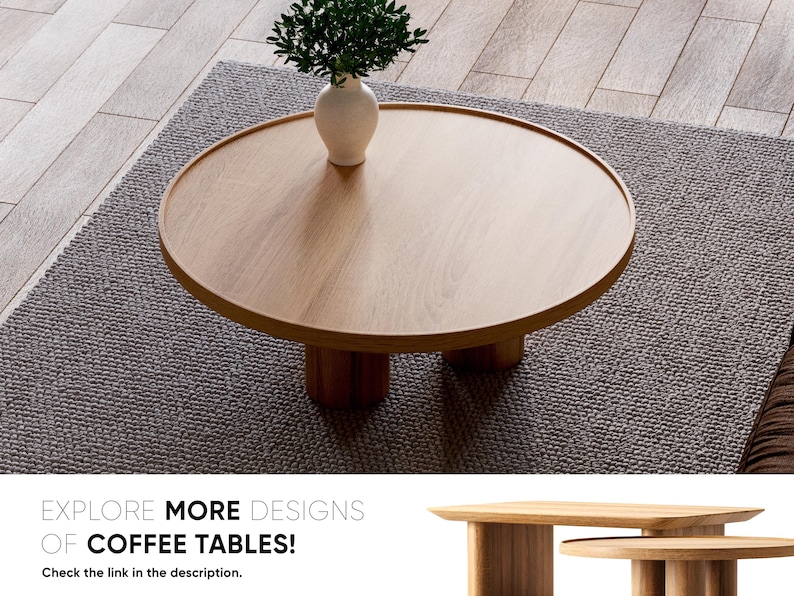 May include: A round wooden coffee table with a light brown finish and four legs. The table is sitting on a grey rug.