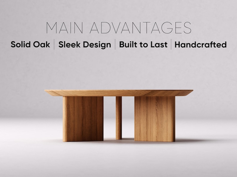 May include: A solid oak coffee table with a sleek design. The table has a rectangular top and two thick, rectangular legs with a single, thinner leg in the center. The text on the image reads: Main Advantages, Solid Oak, Sleek Design, Built to Last, Handcrafted.