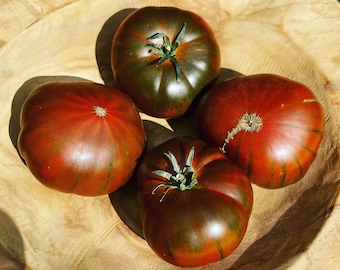 Semillas de tomate RAF "Sweet Marmande", una antigua variedad de tomate de carne dulce y deliciosa con una nota ligeramente salada.