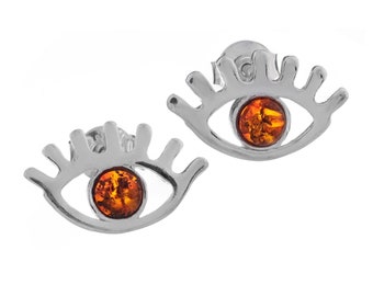Silver earrings with amber eyes