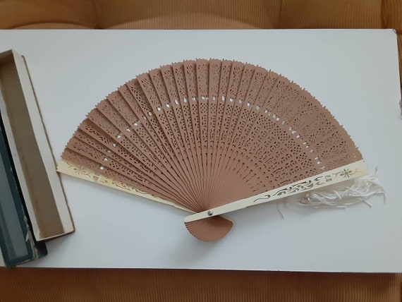 Old wooden fan with tassel - image 1